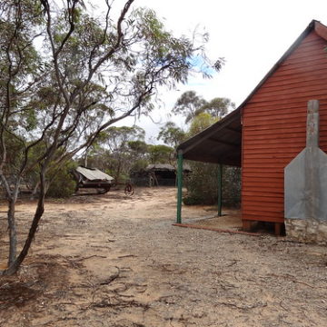 Karoonda. Pioneer Park with railway and Mallee farming structures and items. Mallee farm house and yard.