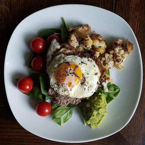 I made this for dinner last night. It was delicious! Paleo, whole 30, keto, amazing! Grass fed beef patty, baby spinach, home grown tomatoes, roasted organic cauliflower, guacamole, and a fried free range chicken egg on top. Suck it big food, I call this