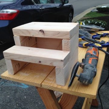 Sanding 2x4 step stool using multi-tool with sanding disc