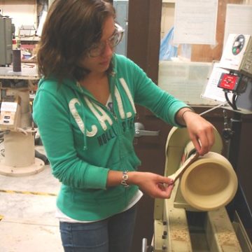 L.K. sanding wooden bowl