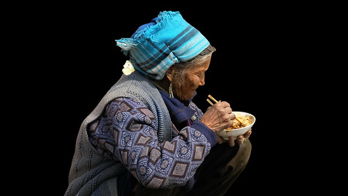 China - Dali - Old Woman Eating Noodle Soup - 1d