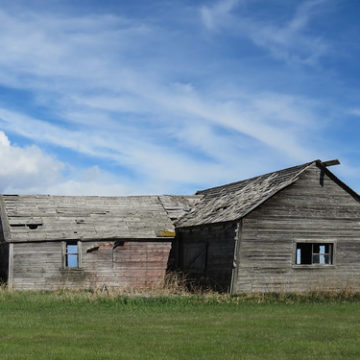 Old sheds/barn against a beautiful sky