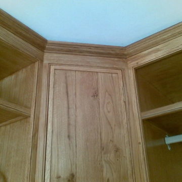 Close up of fully fitted Oak dressing room