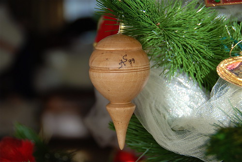 Hanging ornaments on the tree....