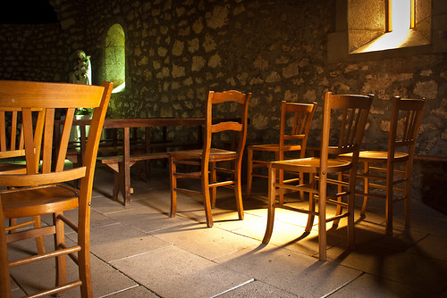 chairs in a pool of light, la chapelle sainte-foy.