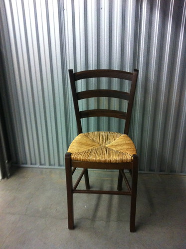 Wooden chairs with rush seats