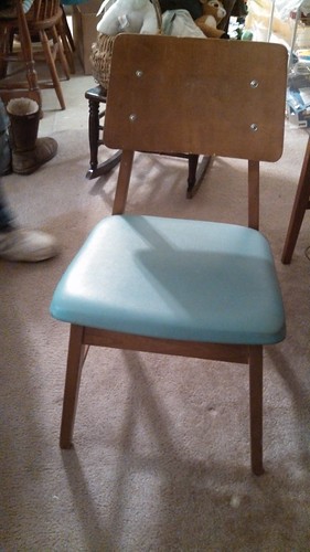 105 $3.00 wooden chair-blue cushionliving room