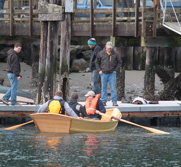 IMG_9356- Port Hadlock WA - Northwest School of Wooden Boatbuilding - small craft launch March 5th, 2014 - Light McKenzie River Boat returning to the pier