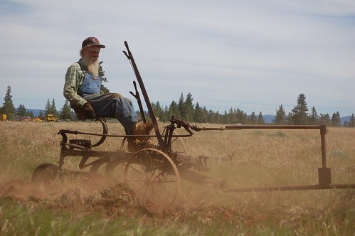 Willie running an antique plow behind an antique Case tractor HDR