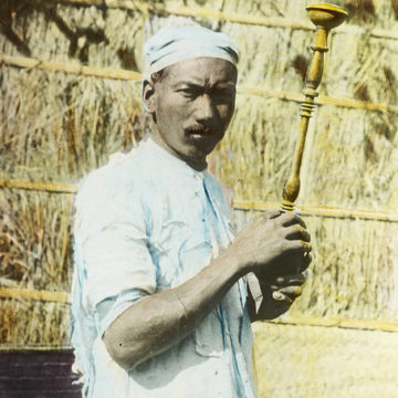 Man with wood-turned object, India, ca. 1920 (IMP-CSCNWW33-OS16-19)