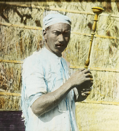 Man with wood-turned object, India, ca. 1920 (IMP-CSCNWW33-OS16-19)