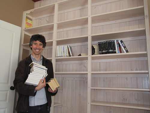 Brett Loading His Bookshelf - Strawbale House Build in Redmond Western Australia