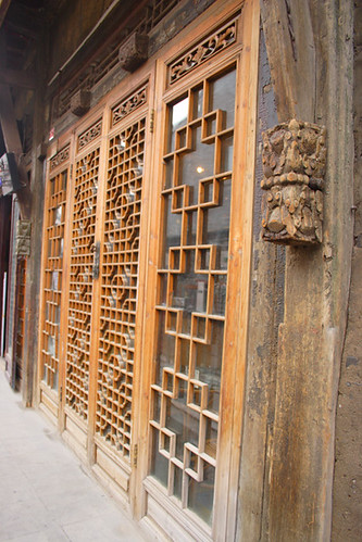 Intricate door woodwork Pipe Maker Lane Beijing