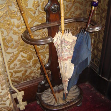 Umbrellas and stand in front entry - Gibson House