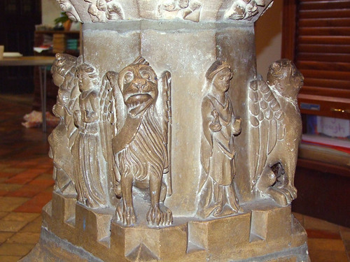 Font: Joan, Maid of Ipswich (left) and John Bailey, rector (right) between evangelist symbols (early 16th Century)