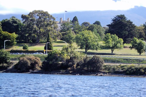 Hobart. A partial view of the Gothic Government House of Tasmania from the Derwent River.