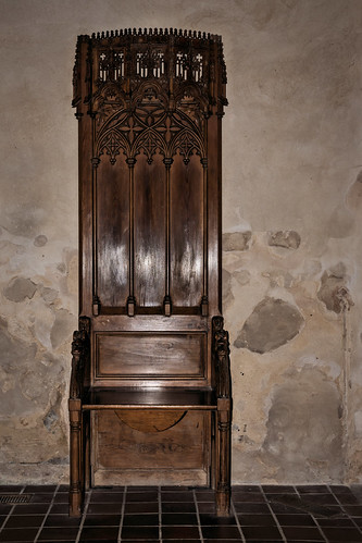 Ornate carved high back chair