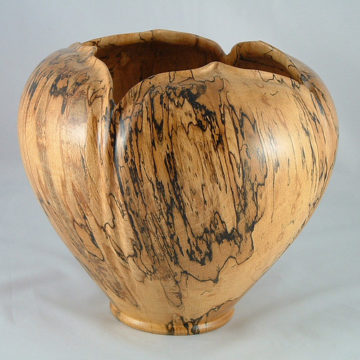 turned and carved vessel