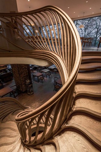 A sculptural wood spiral staircase