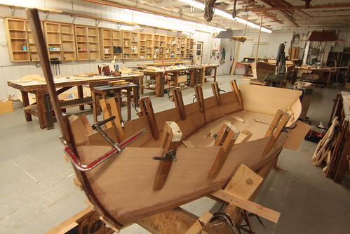 IMG_8246 - Port Hadlock WA - Northwest School of Wooden Boatbuilding - Skiff Construction - Bruce Blatchley section - Atkin Flipper dinghy - end of day - clamps hold riser in place