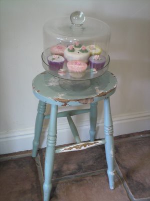 Wooden stool....cupcakes in a cloche..