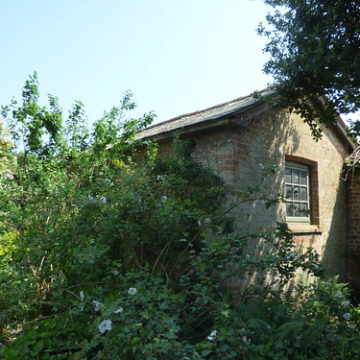 The Walled Garden at Coughton Court - brick shed outside