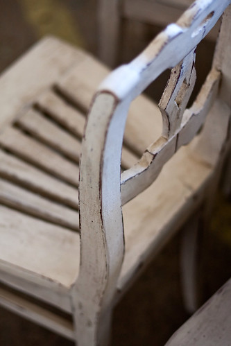 Simple antique wooden chair painted white